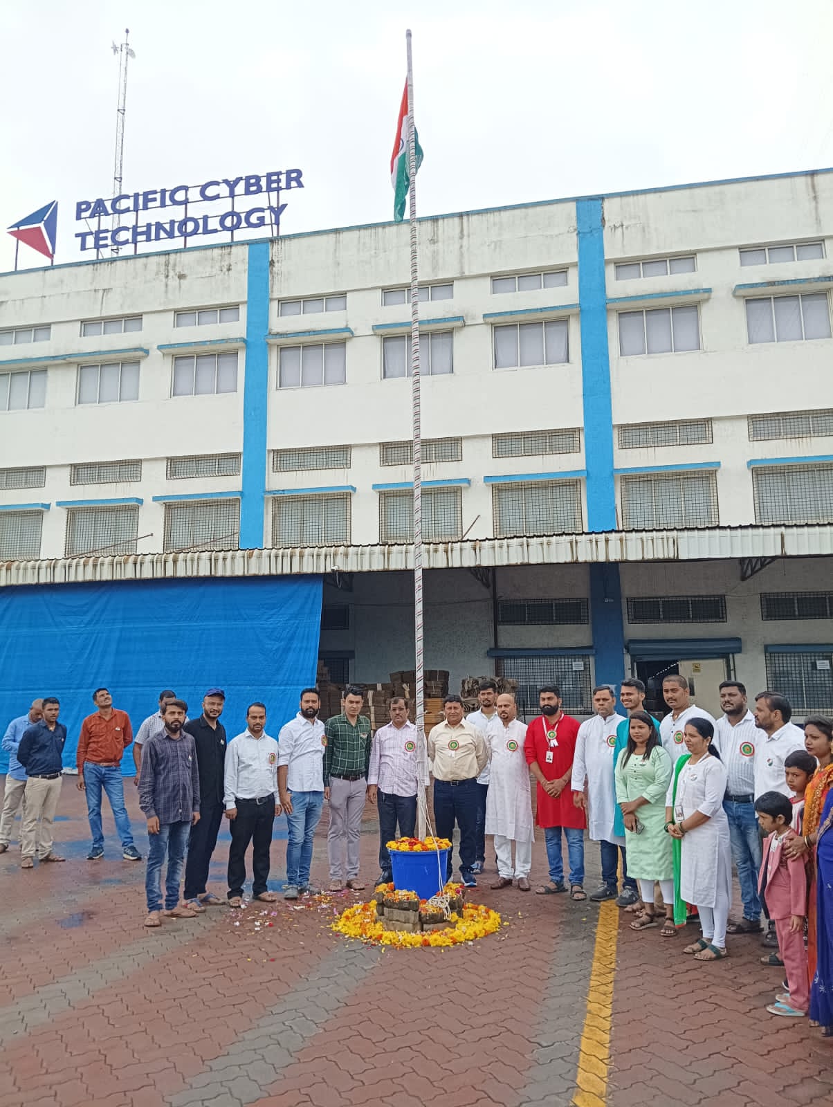 PCT team outside the factory